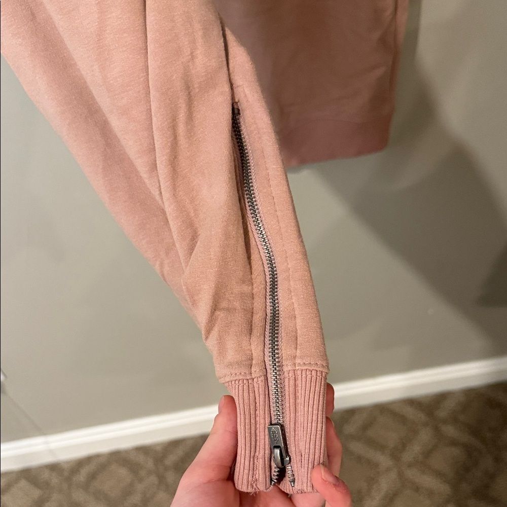 Free People movement dusty rose colored joggers with ankle zip and drawstring - Picture 5 of 13